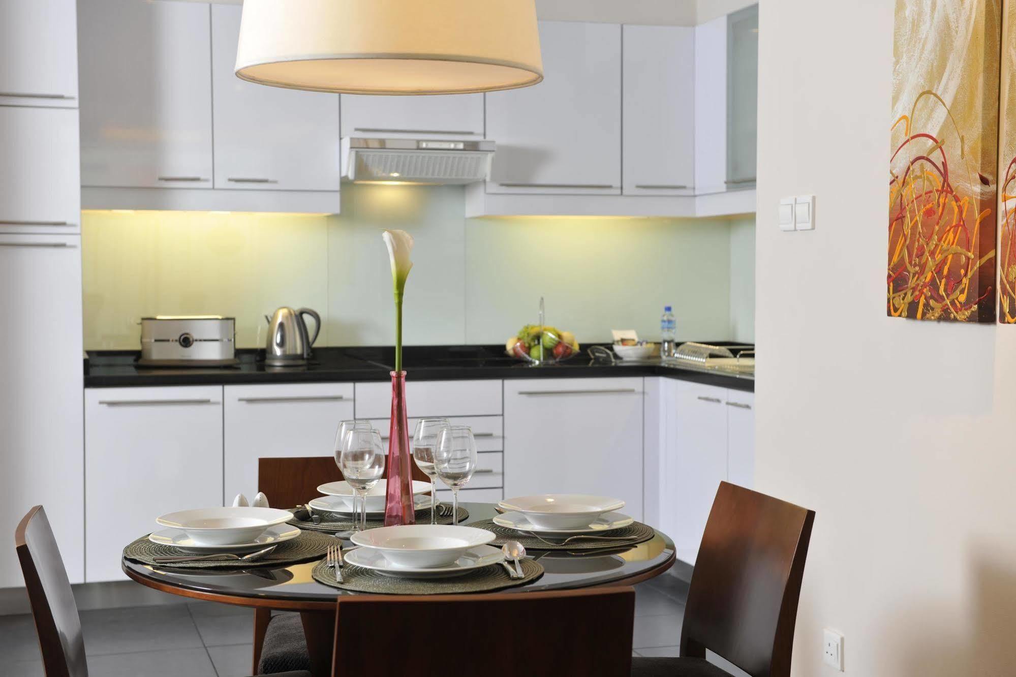 Fraser Suites Seef Bahrain Manama Chambre photo A kitchen in a serviced apartment